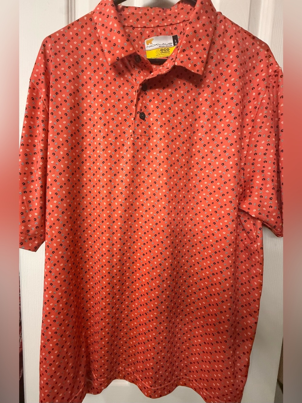 Nice polo by Nicklaus in a beautiful bright Orange ready for a fun day of golf